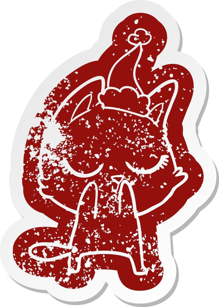 calm cartoon distressed sticker of a cat wearing santa hat vector