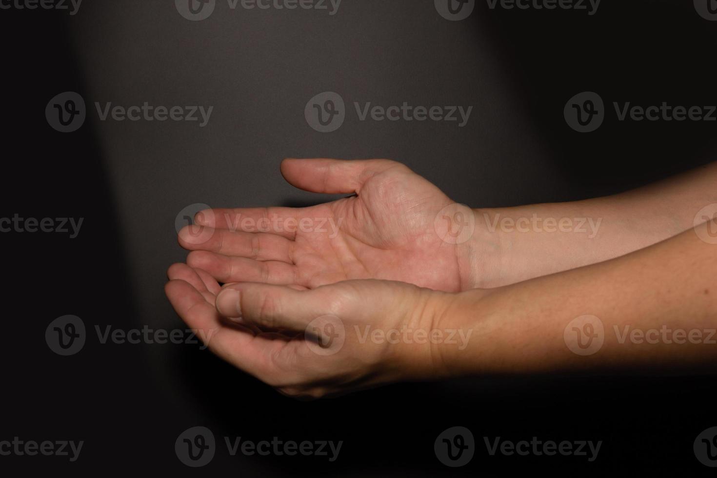 The man whose hand is praying photo