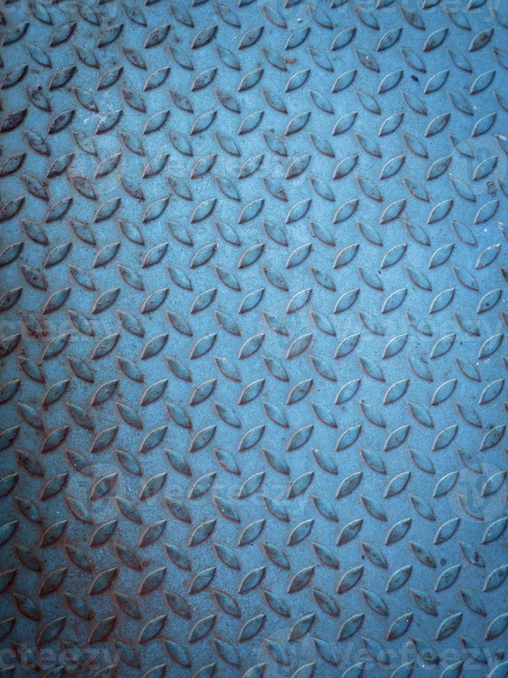 Blue steel plate texture background with diamond pattern. photo