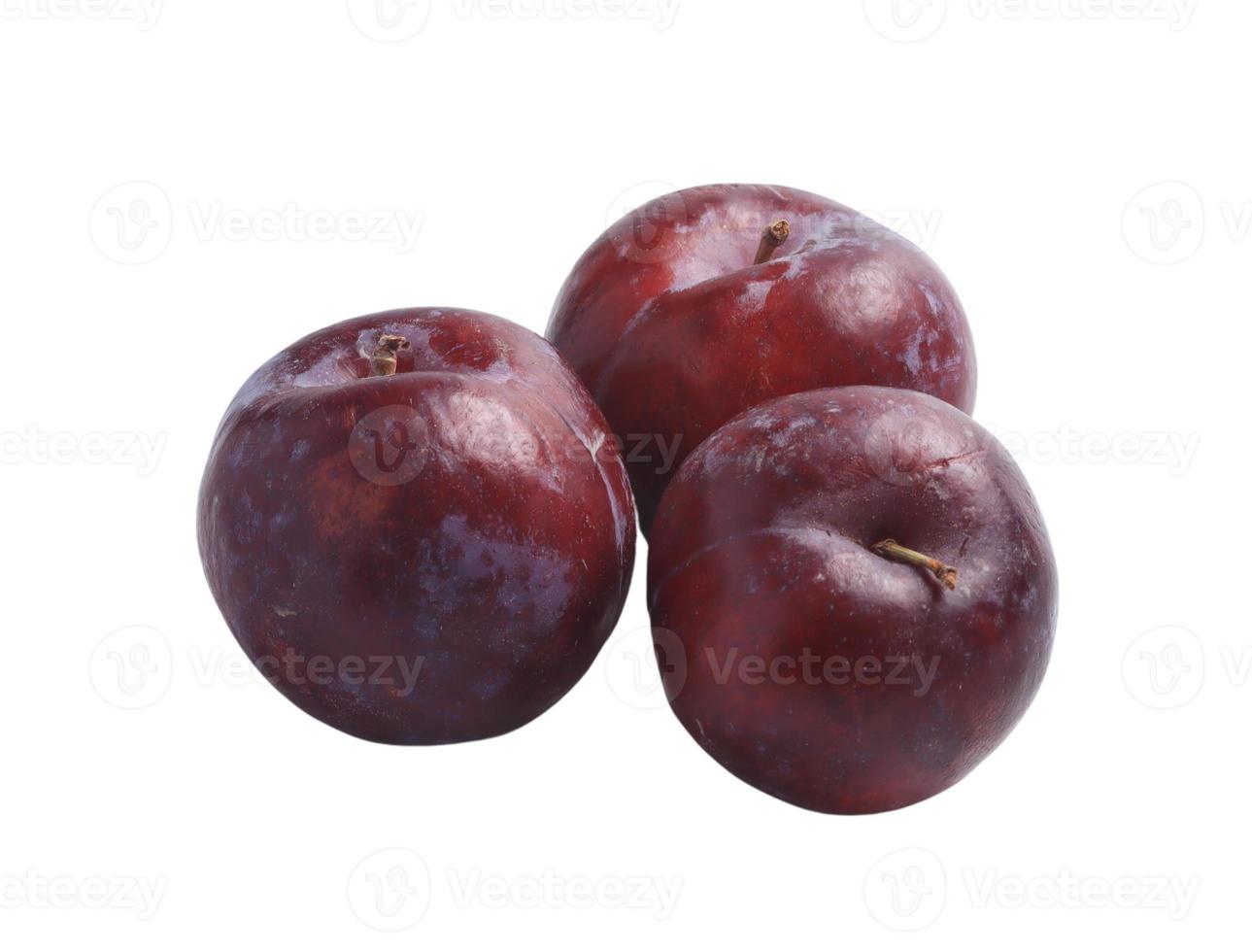 Fresh plum on a white background, unretouched. photo