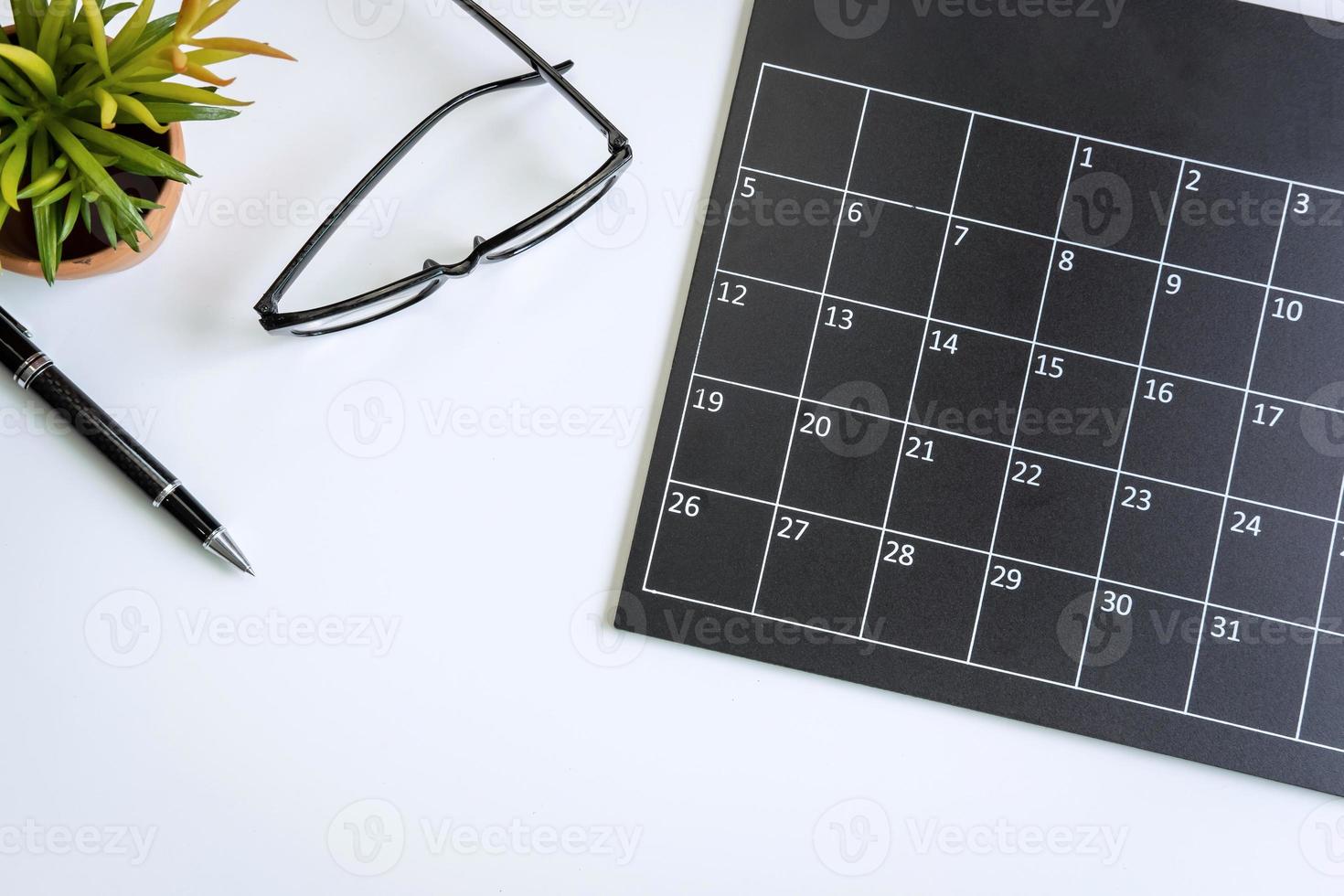 Planning calendar on business desk office, Top view photo