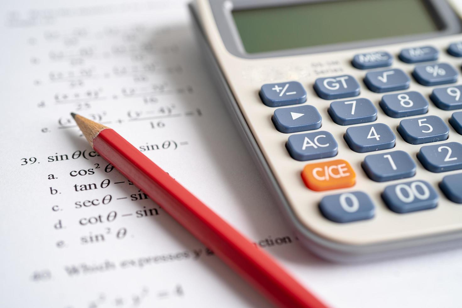 Pencil on mathematic formula exercise test paper in education school. photo