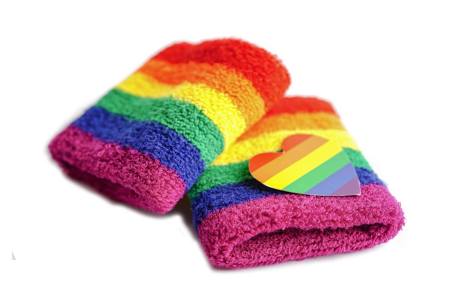 rainbow flag wristbands isolate on white background with clipping path, symbol of LGBT pride month celebrate annual in June social of gay, lesbian, bisexual, transgender, human rights. photo