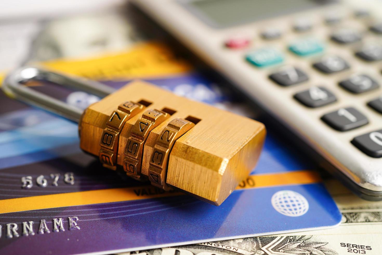 Credit card with password key lock, finance saving and security shopping online concept. photo