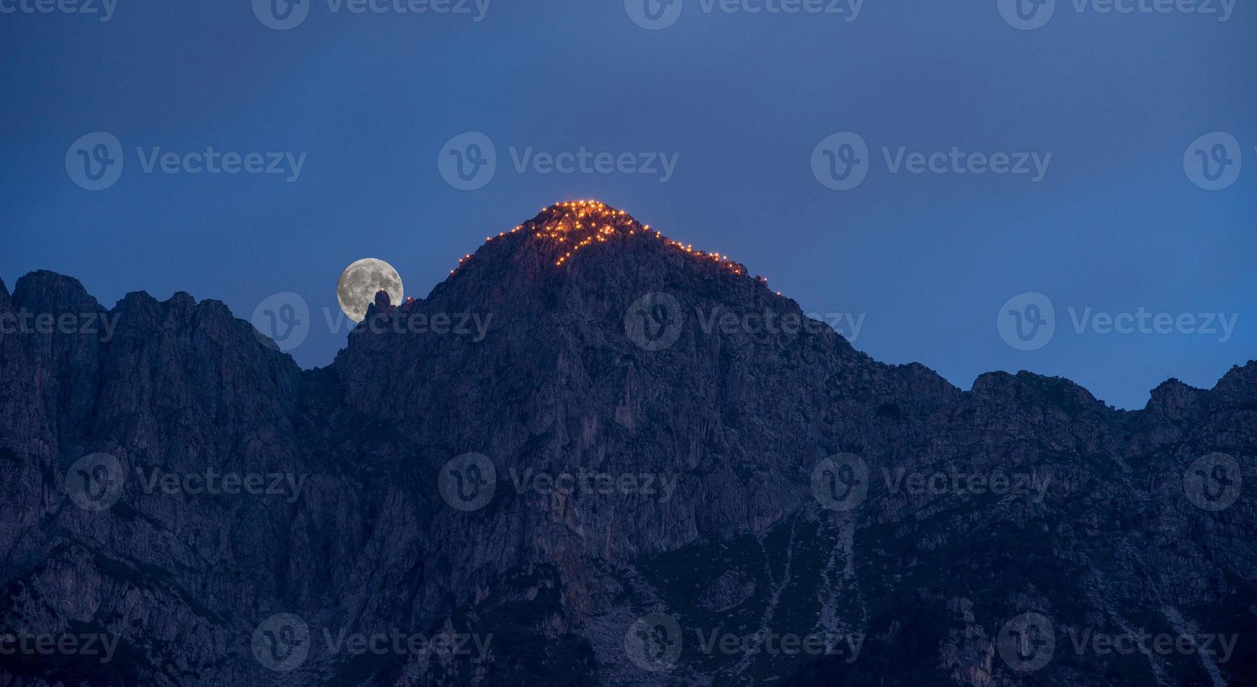 Mountain lit with torches photo