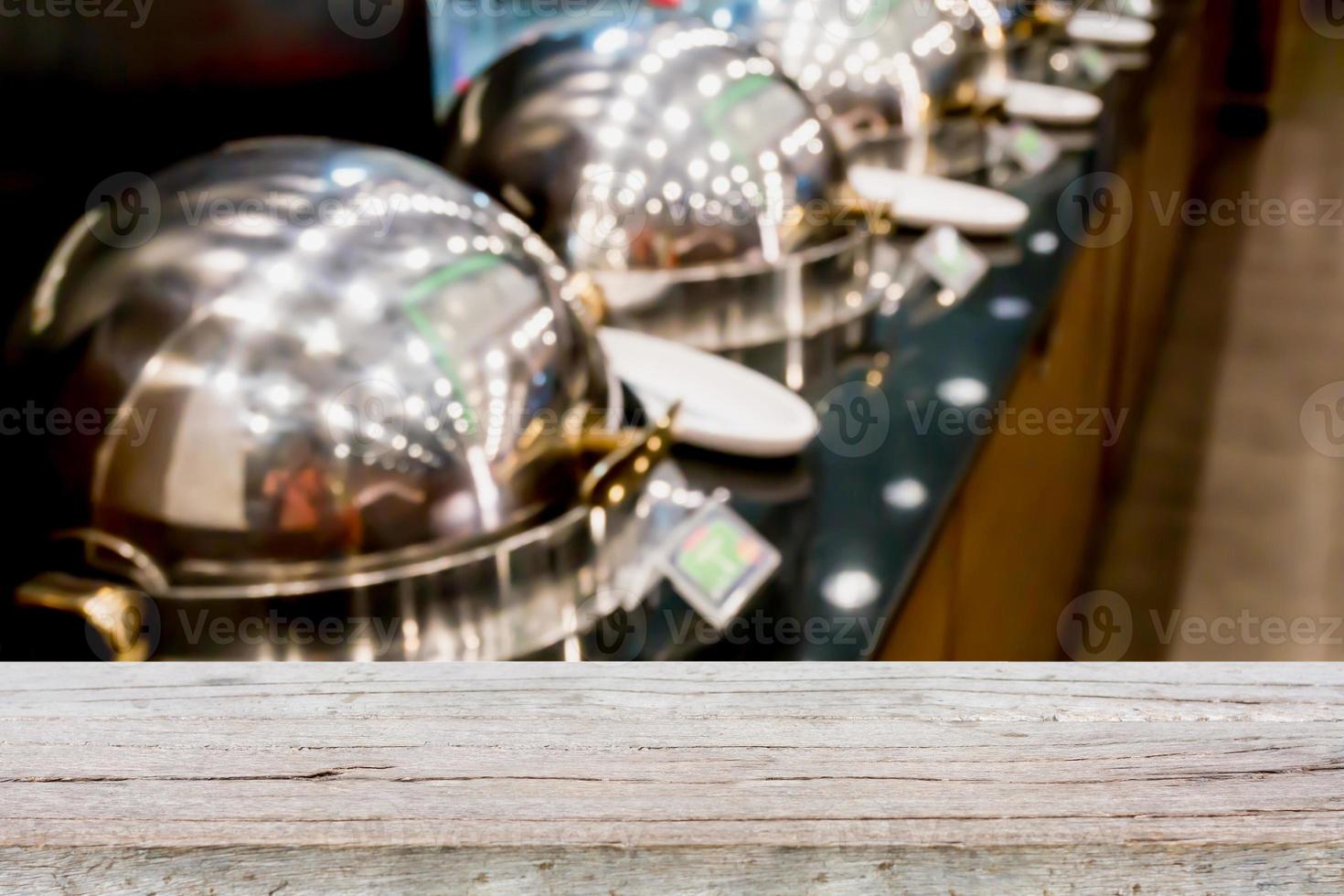 wood table top on buffet heated trays photo