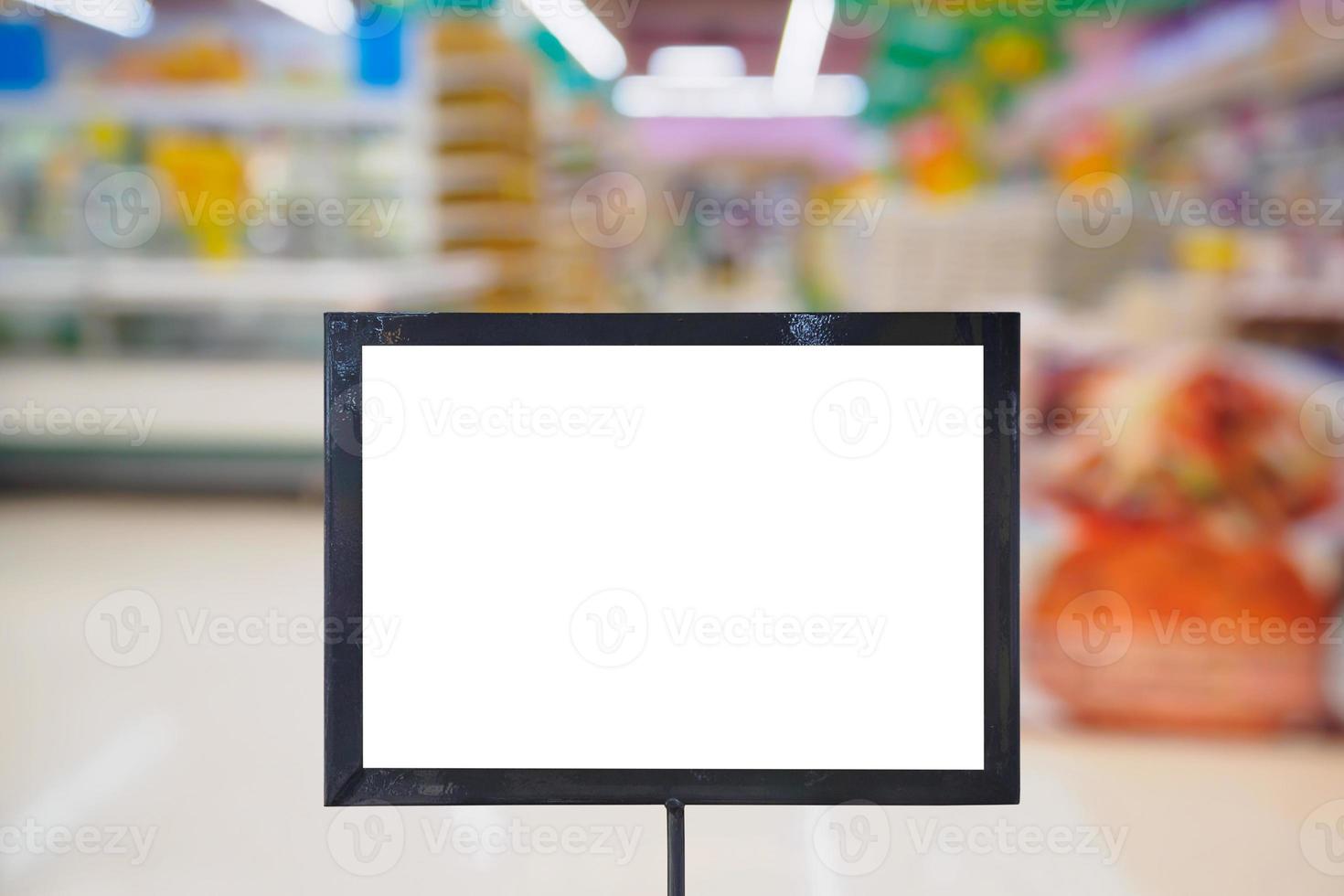 blank board with blur supermarket for background photo