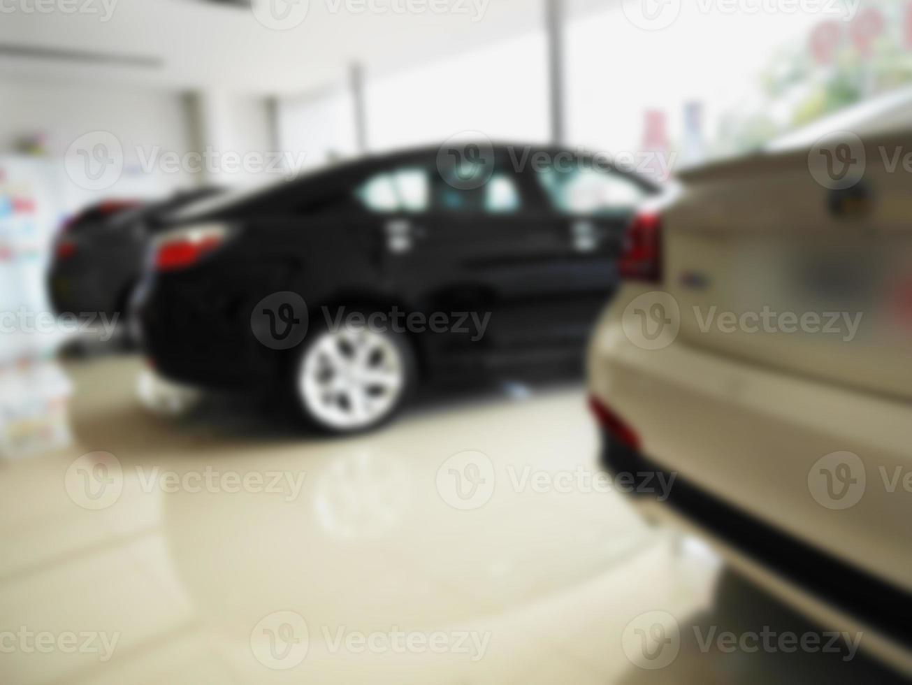 blur photo of new car at car showroom
