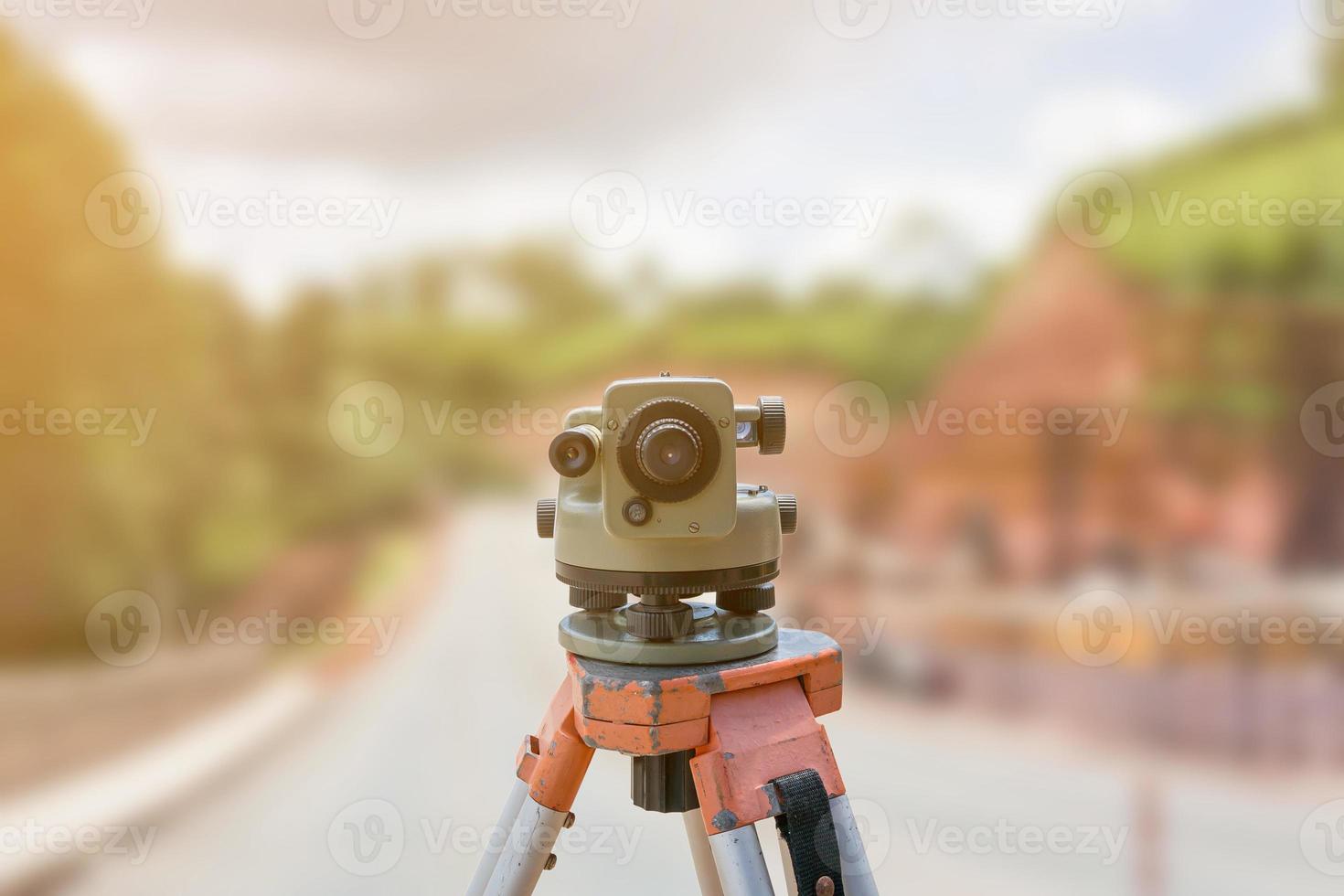 road construction site, theodolite instrument for road construction photo