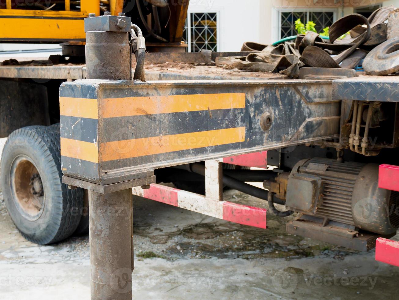 yellow and black color automobile crane truck photo