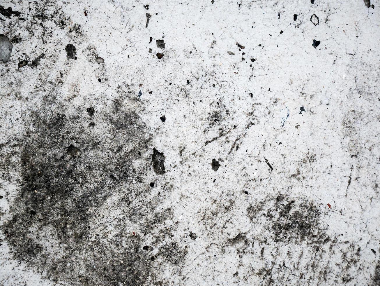 zapatos de hombre estampados en textura de fondo de cemento de hormigón foto