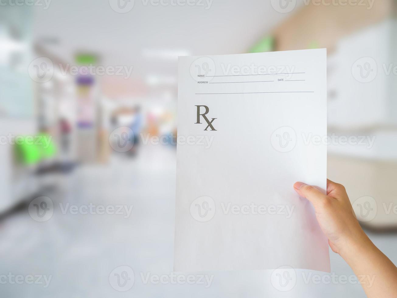 hand hold medical prescription at the hospital photo