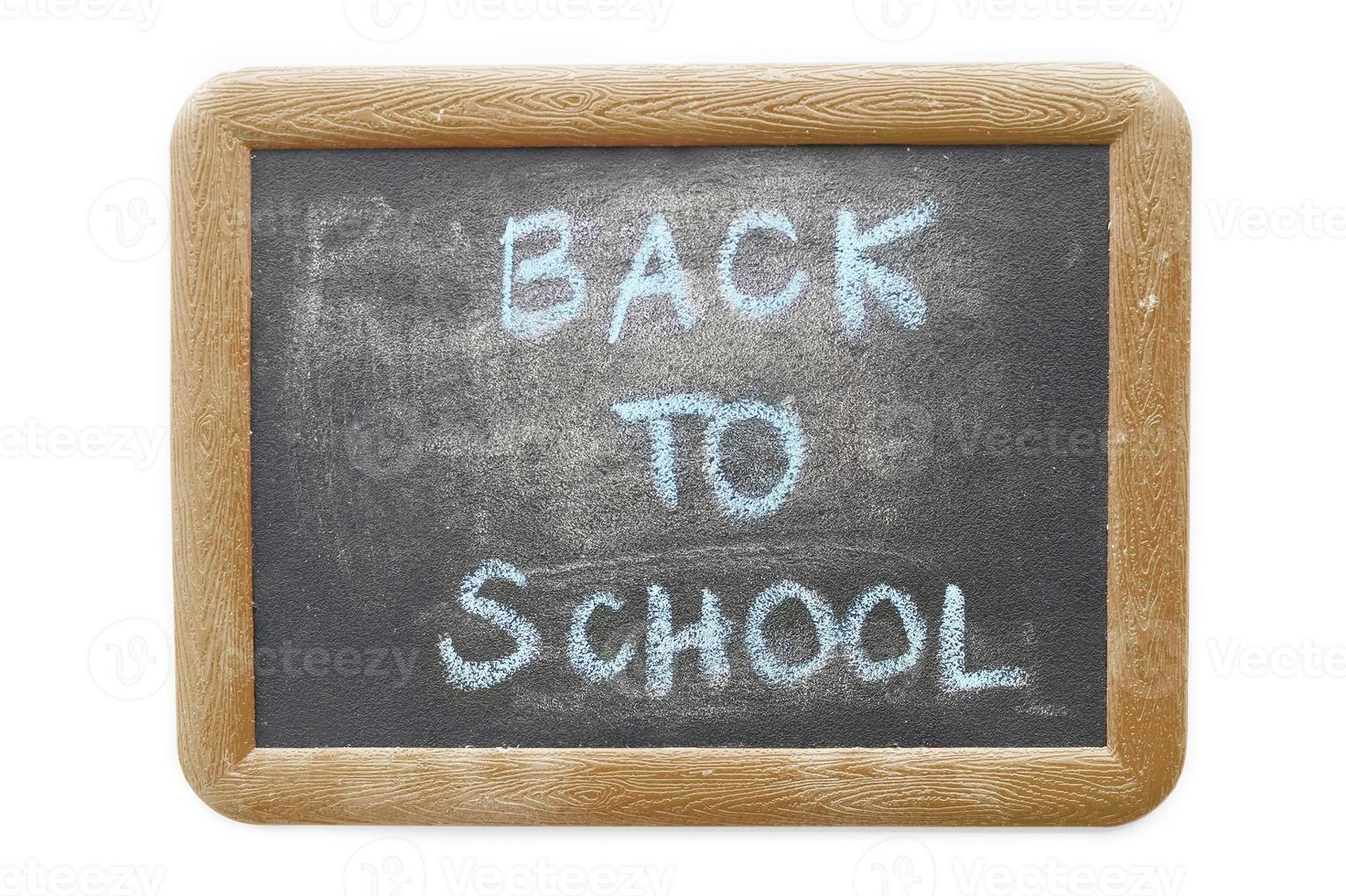 back to school text on chalkboard isolated on white background photo