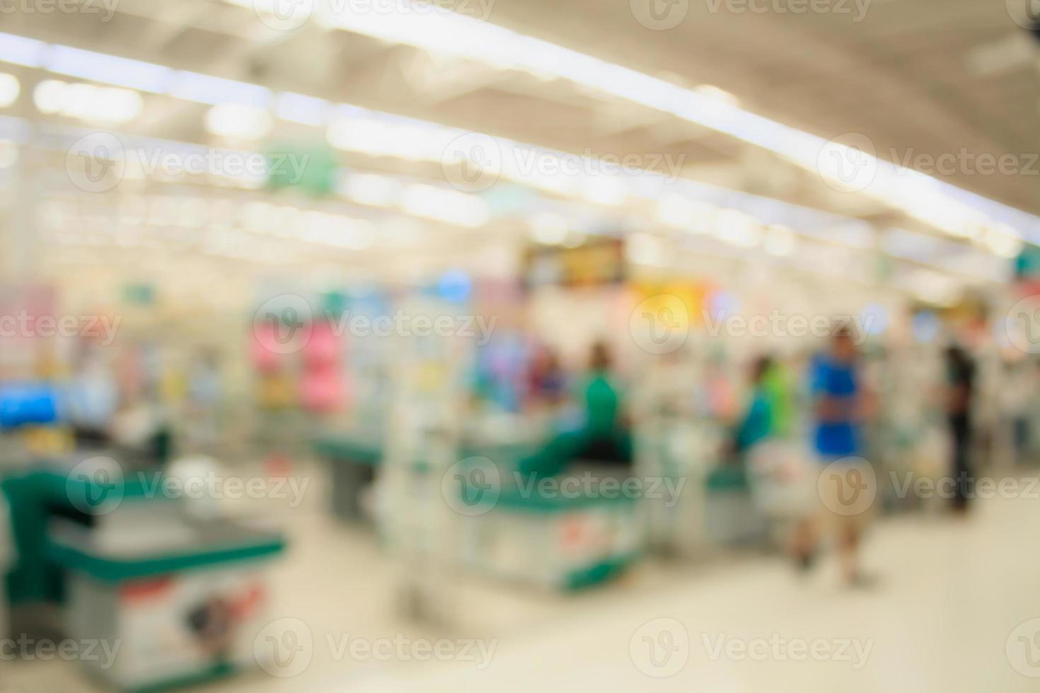 Supermarket store blur background ,Cashier counter with customer photo