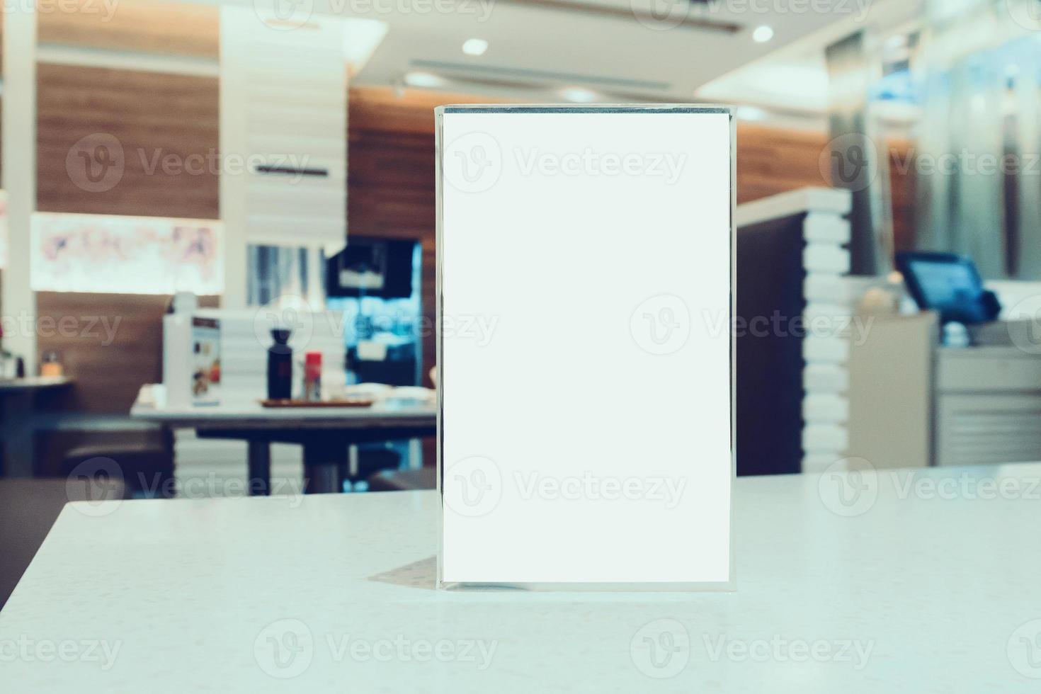 Blank Menu frame on Table in cafe restaurant photo