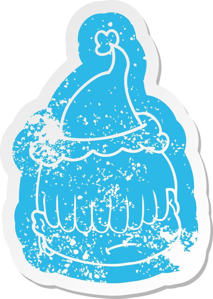 cartoon distressed sticker of a face with hair over eyes wearing santa hat vector