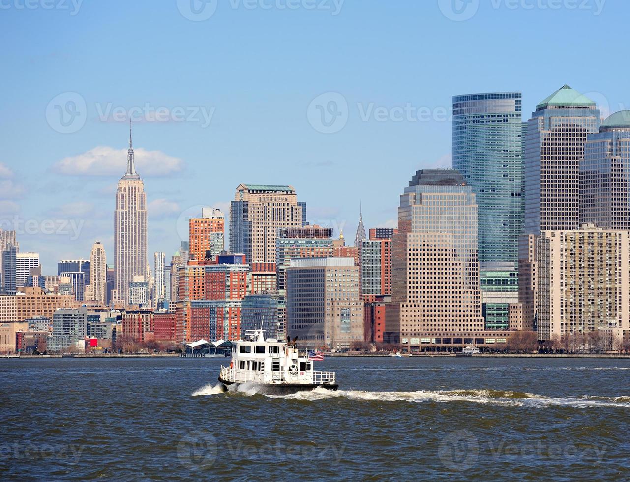 New York City Manhattan skyscrapers and boat photo