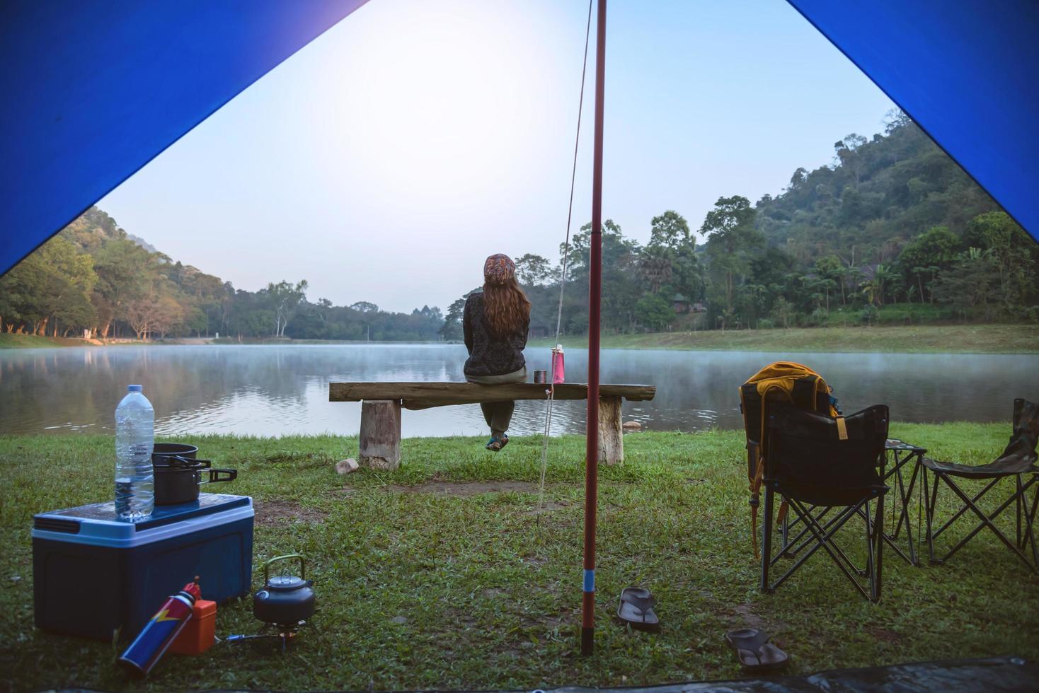 Travel camping by lake. Campers are on their camp at Namtok Sam Lan National Park Saraburi, in Thailand. photo