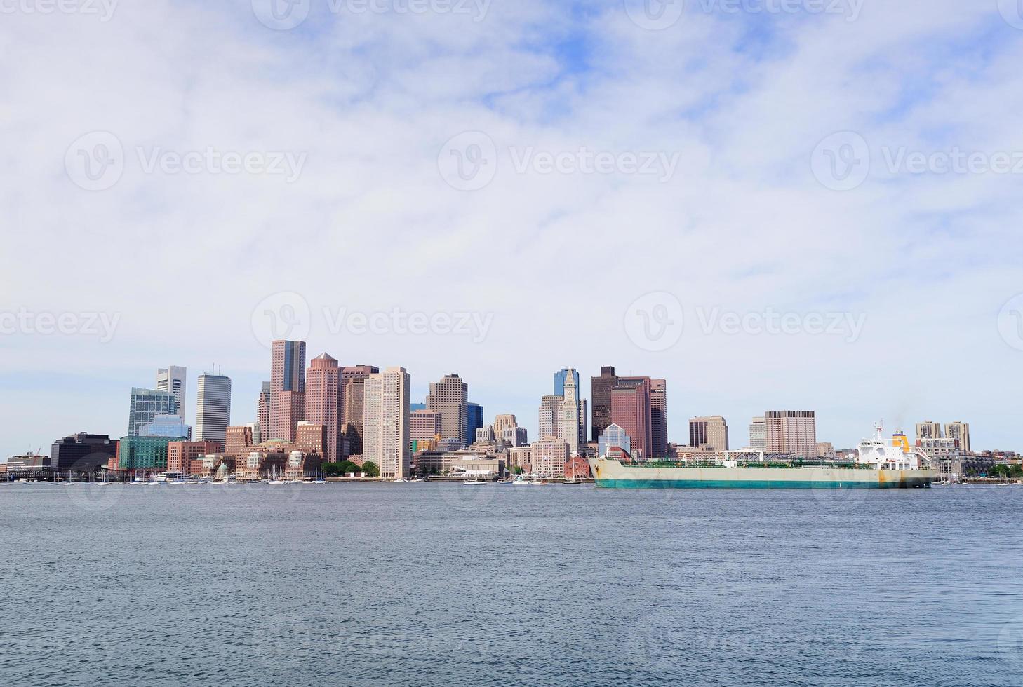 Urban city skyline over sea photo