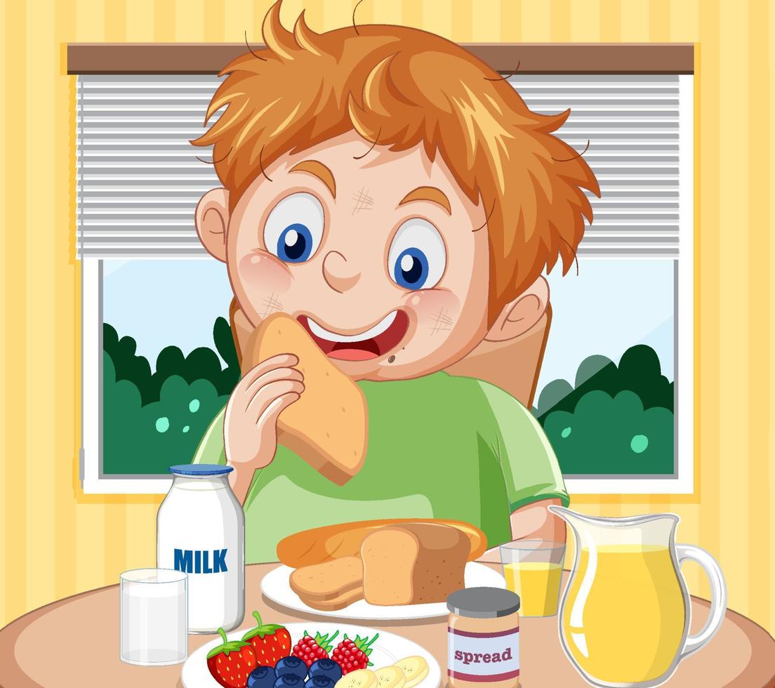 un niño desayunando en la mesa vector