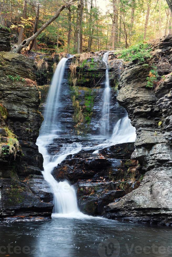 Autumn Waterfall in mountain photo