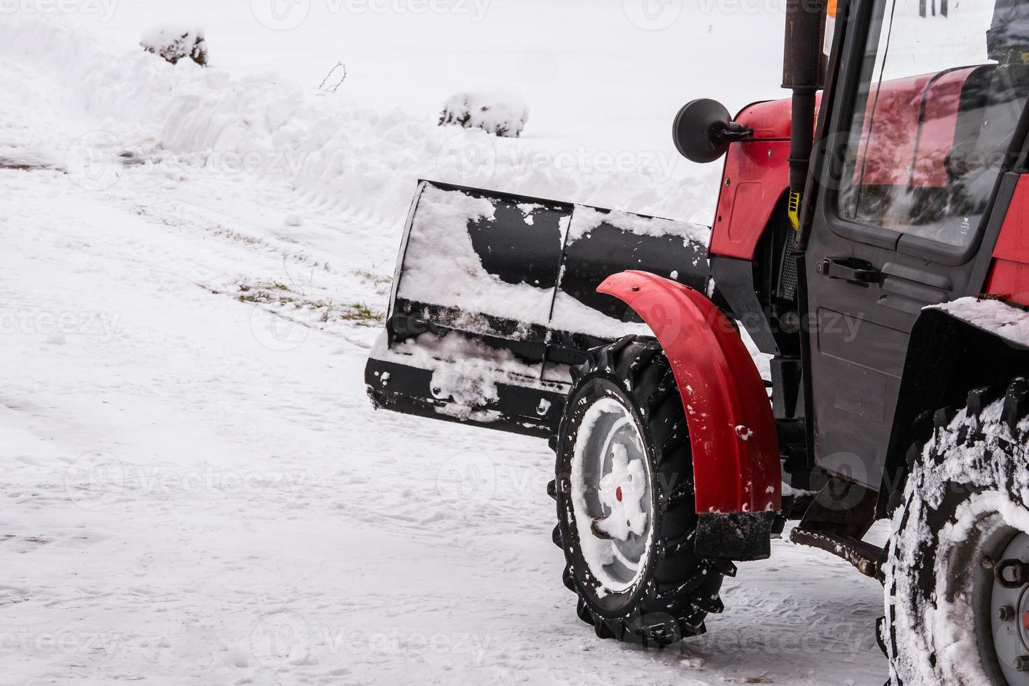 snow removal in the winter the tractor photo