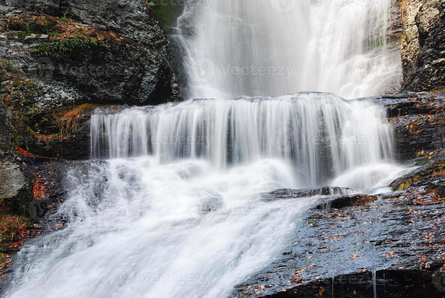 Autumn Waterfall in mountain photo