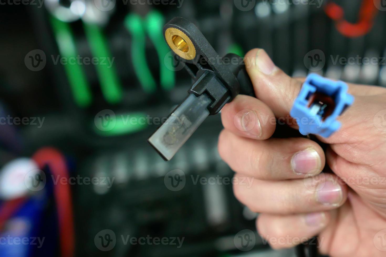 The ABS sensor is a closeup of the hands photo