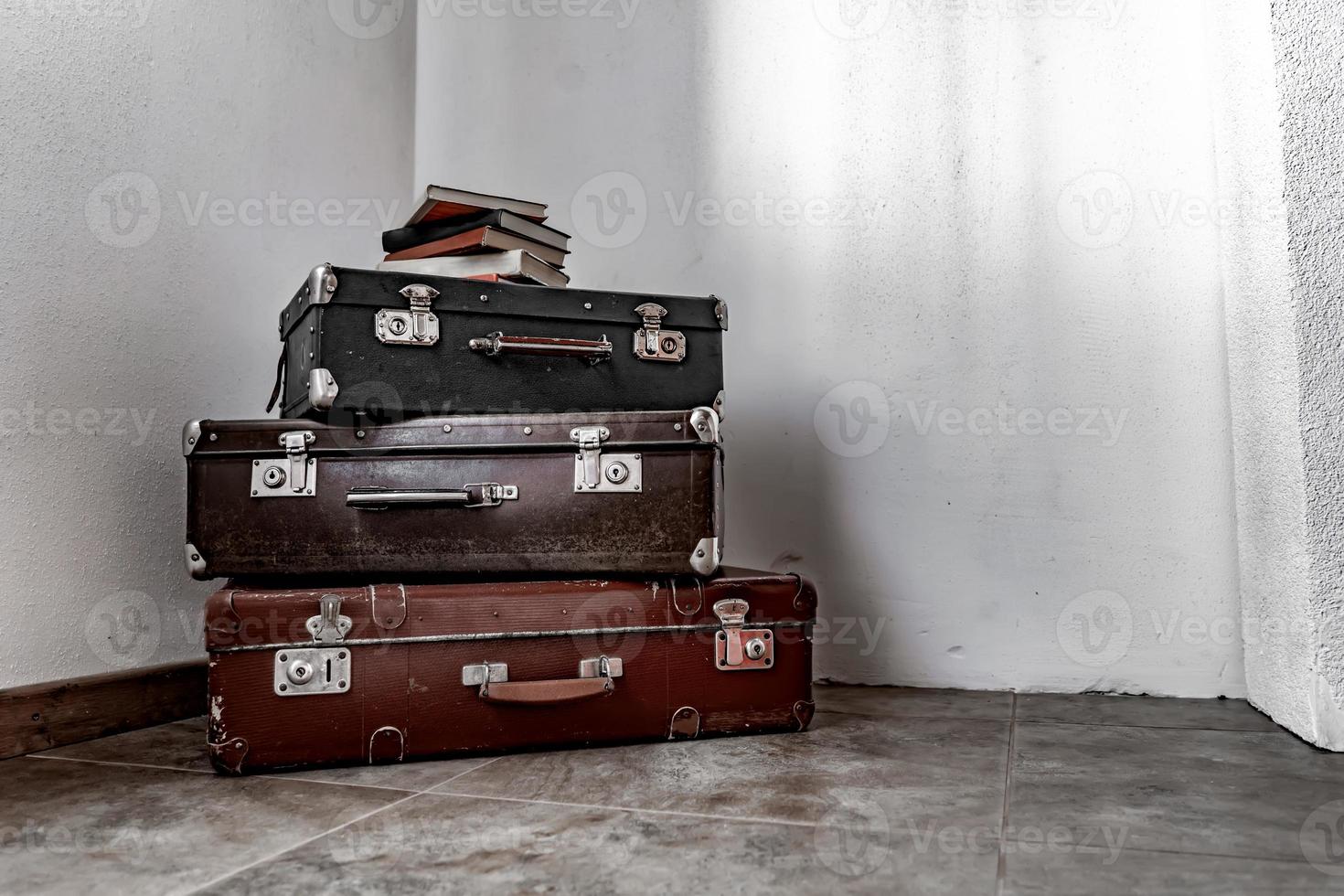 background of old vintage suitcases stacked photo