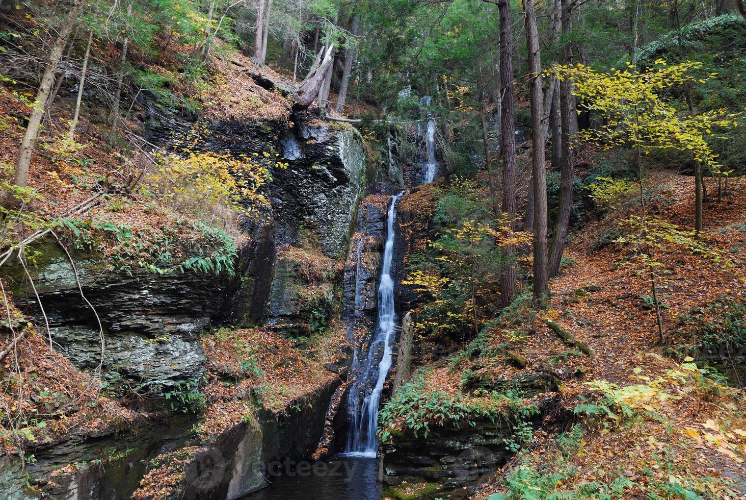 Autumn Waterfall in mountain photo