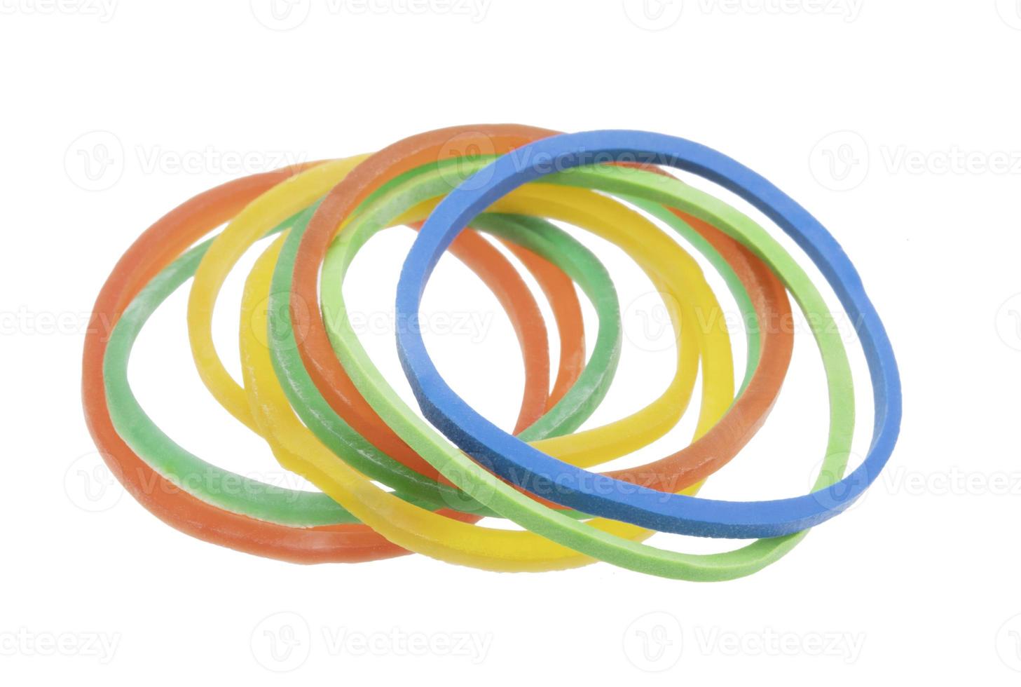 Multicolor rubber bands isolated on white background photo