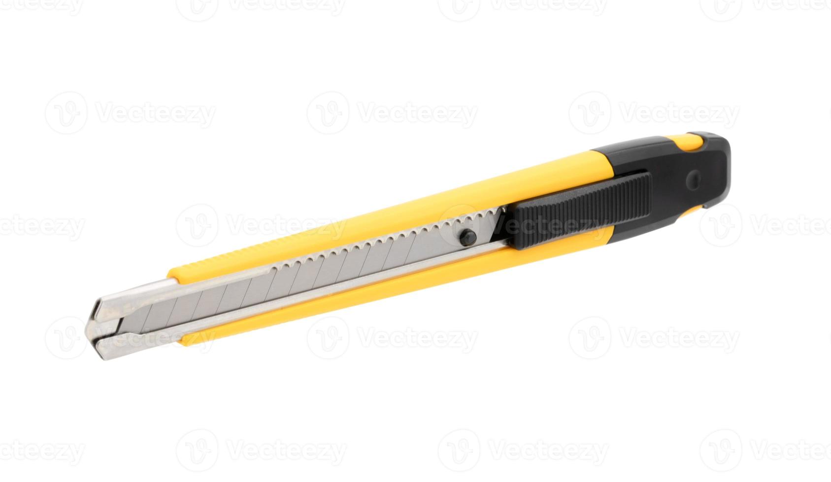 Yellow cutter isolated on white background photo