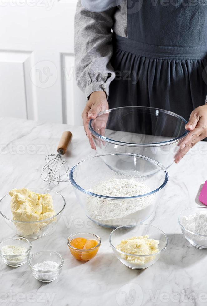 Baking Concept, Preparation Ingredient Baking in the Kitchen, Flour, Egg, Cheese, Sugar. photo