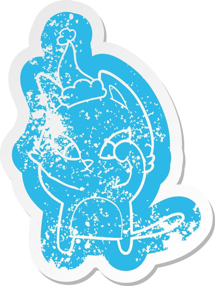 confused cartoon distressed sticker of a cat wearing santa hat vector