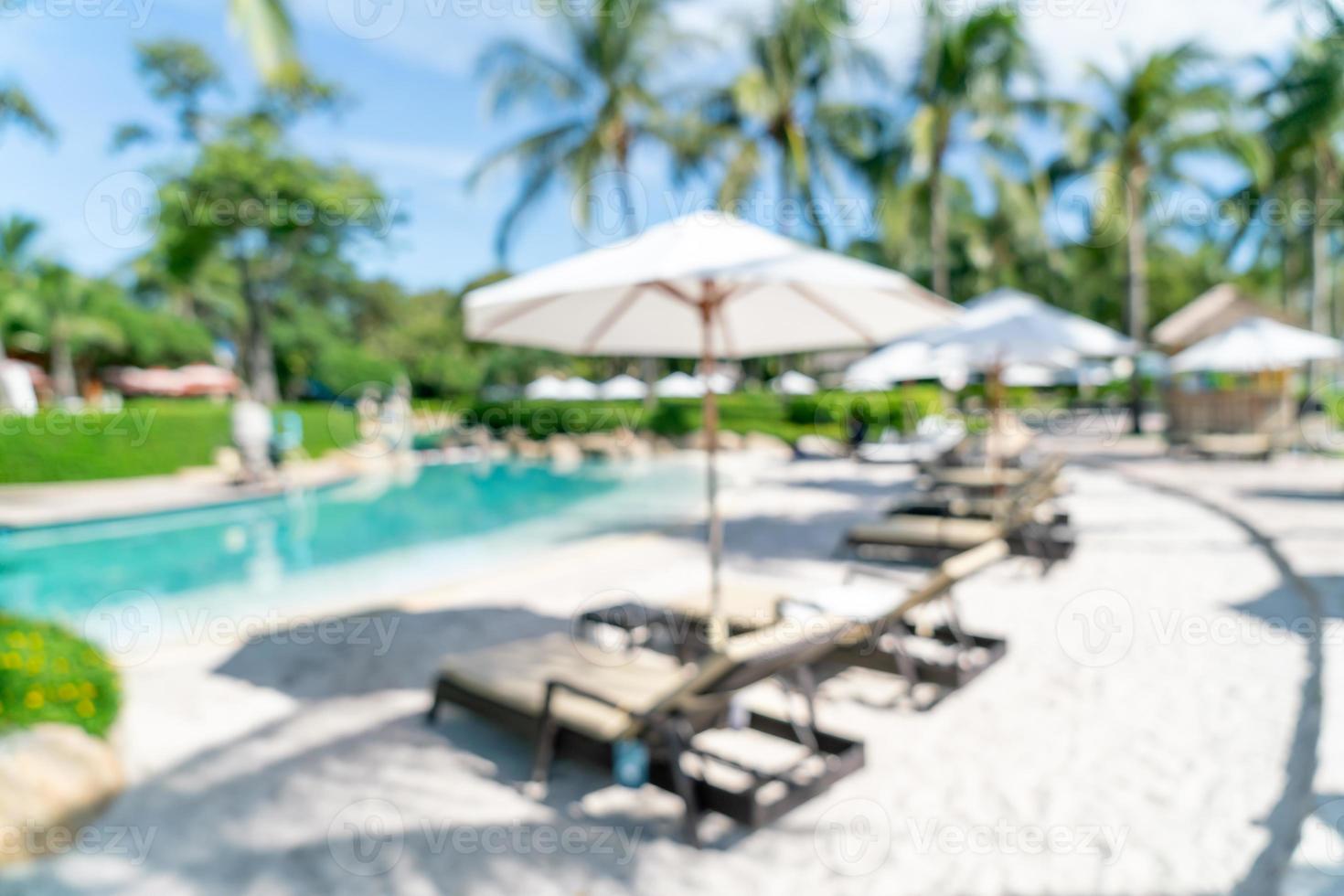 abstract blur bed pool around swimmimg pool in luxury hotel resort for background photo