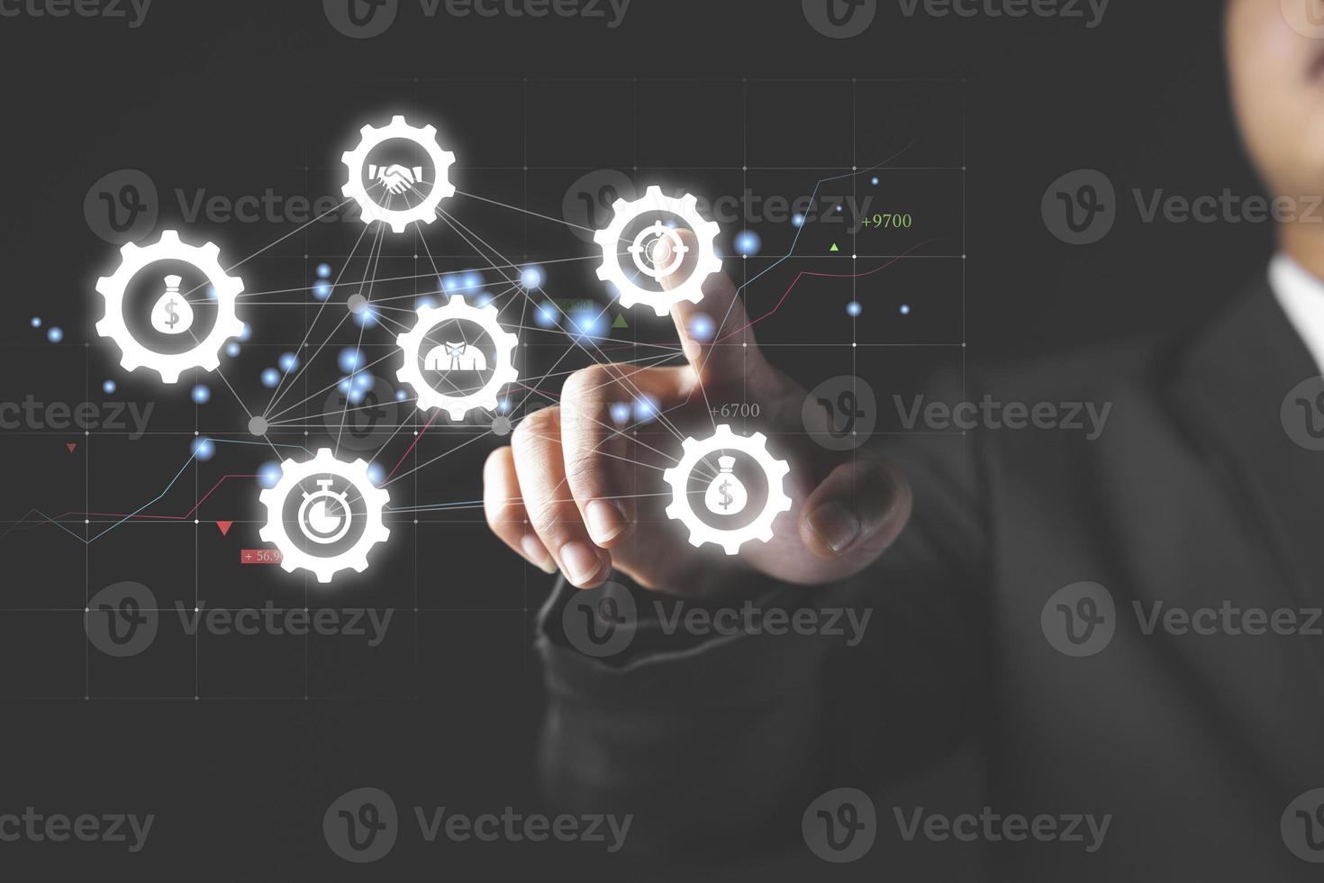 Robotic process automation of business workflows with a businessman in background touching a button photo