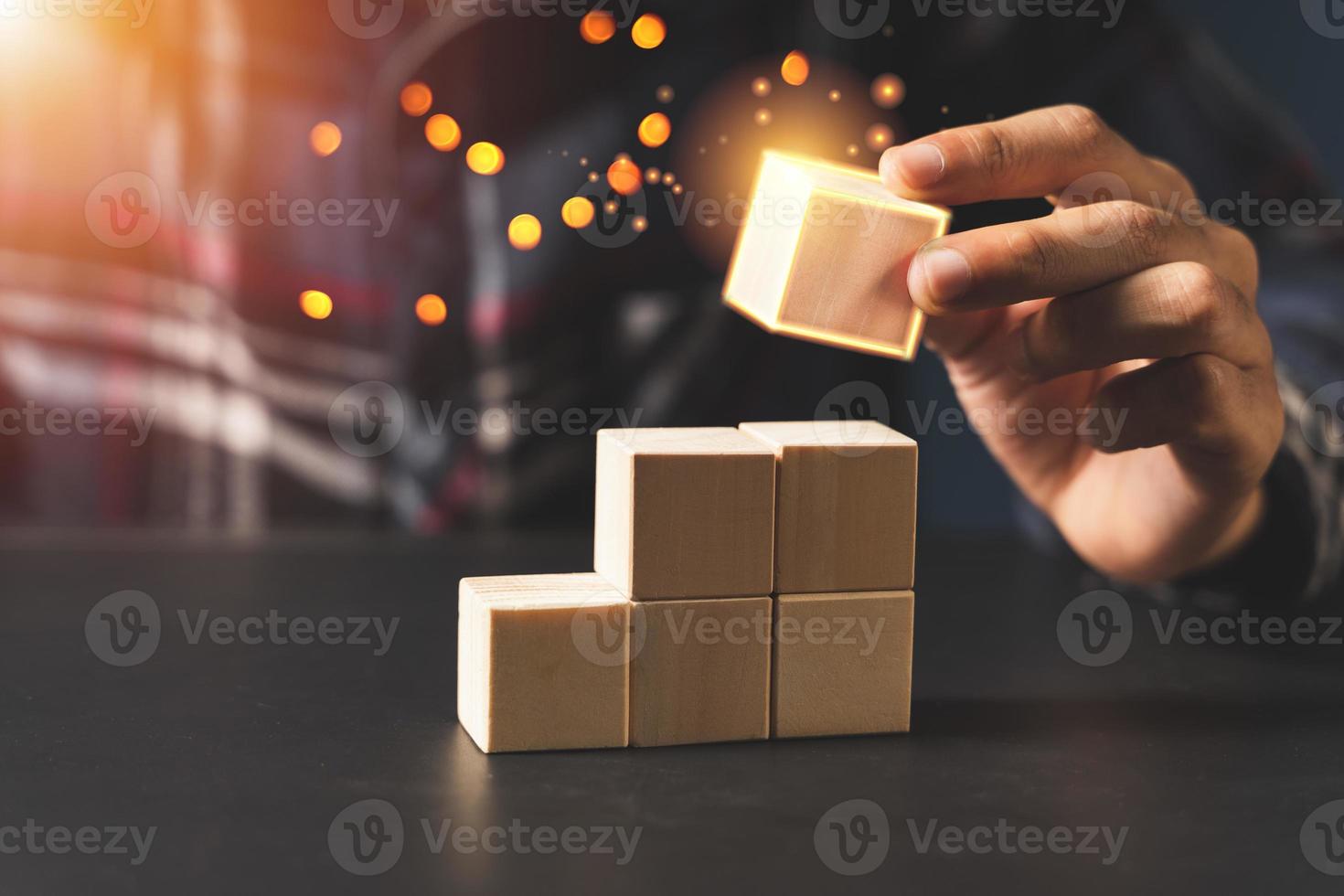 Arrange the wooden blocks into steps, higher the marketing strategy photo