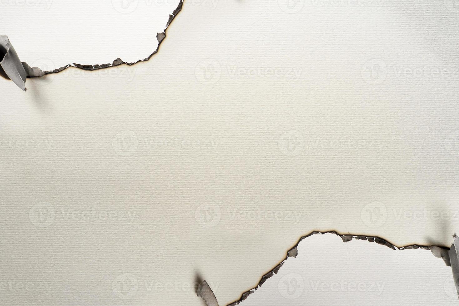 Burning paper on white paper with shadow,text copy space photo