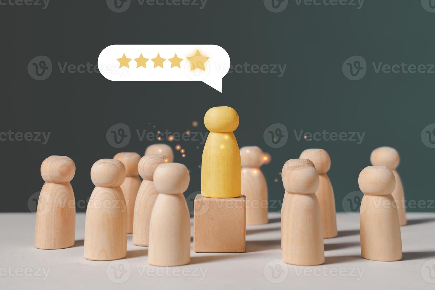 Wooden doll with yellow stars for customer evaluation and satisfaction for product and service photo