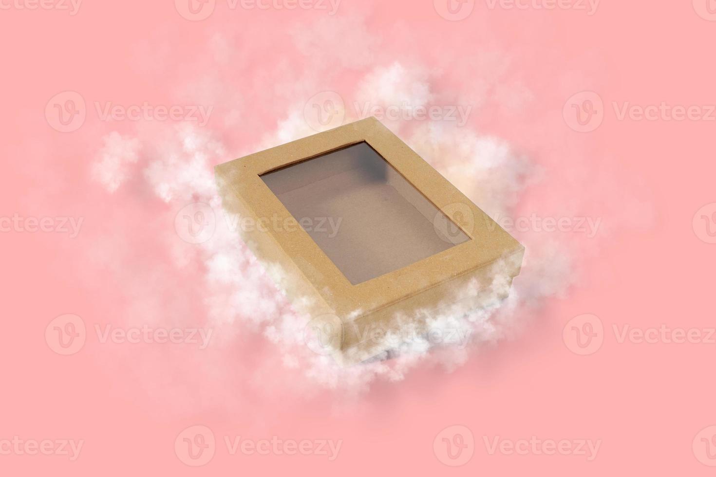 Empty Brown Carton Cardboard box with clouds on Pink background photo