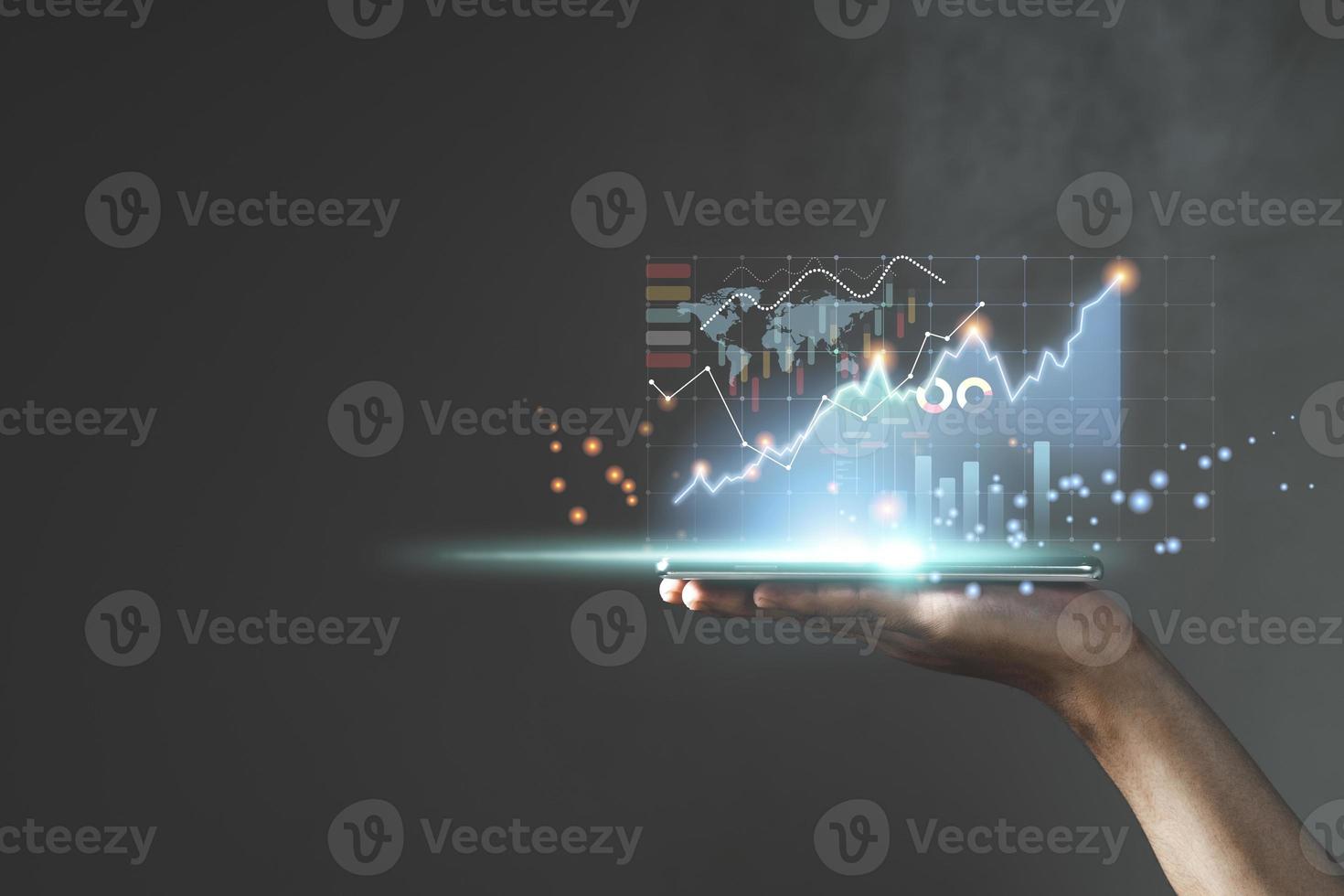 Hand showing graph growth and increase of chart positive indicators photo