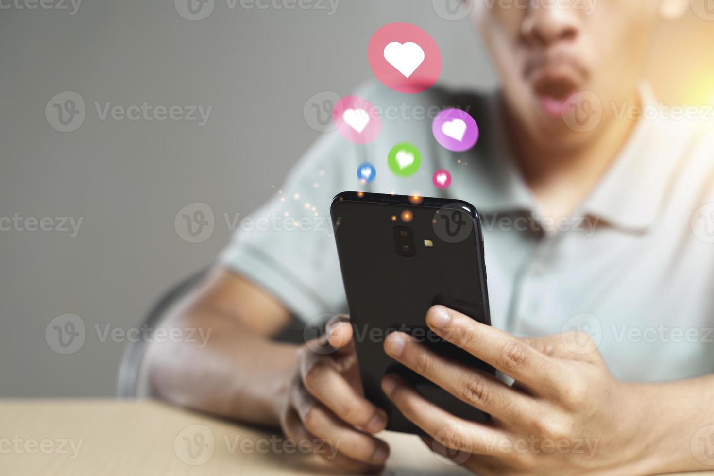 Man using a smartphone social media experience concept photo