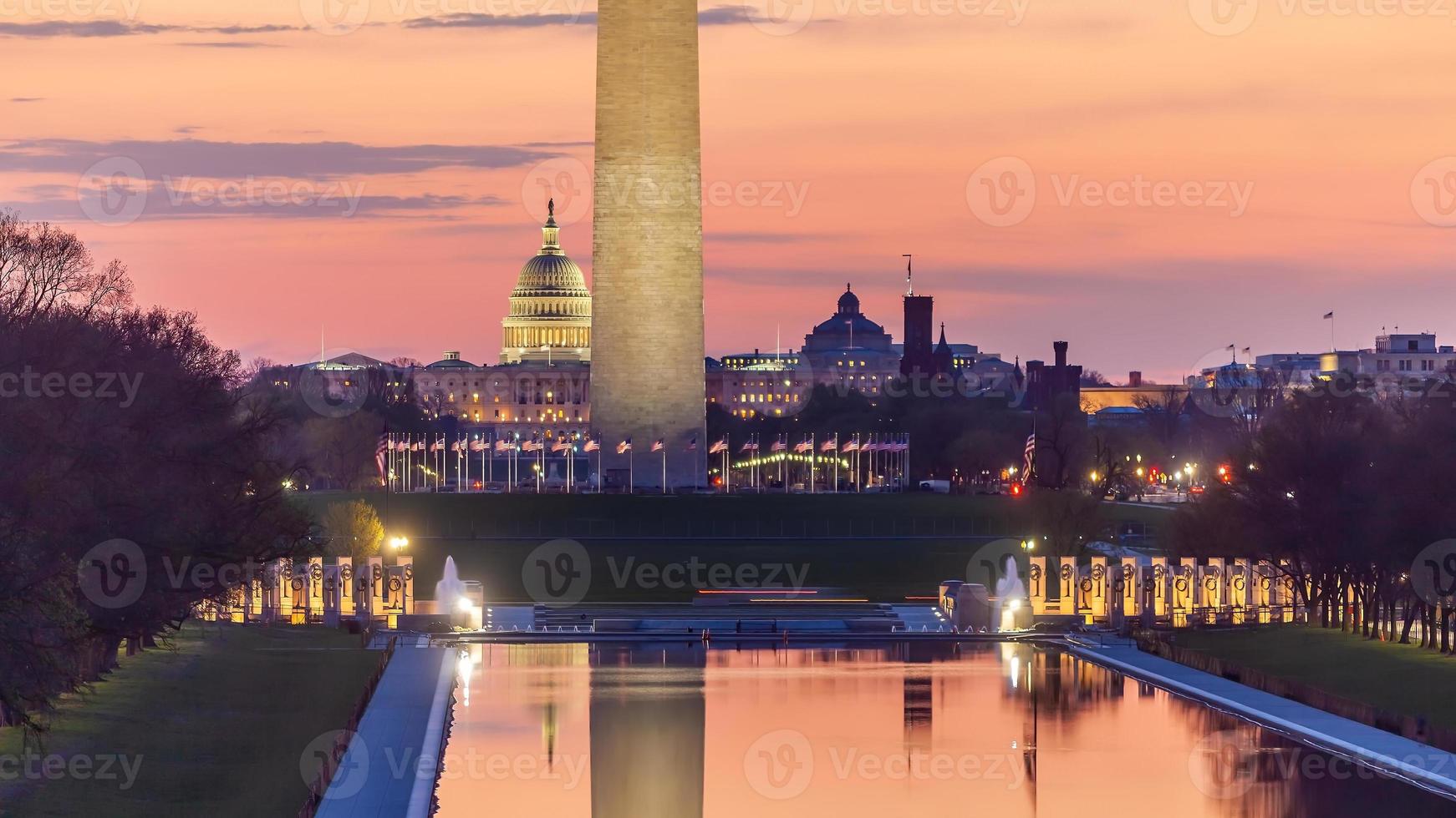 Washington monument, mirrored in the reflecting pool in Washington, DC. photo