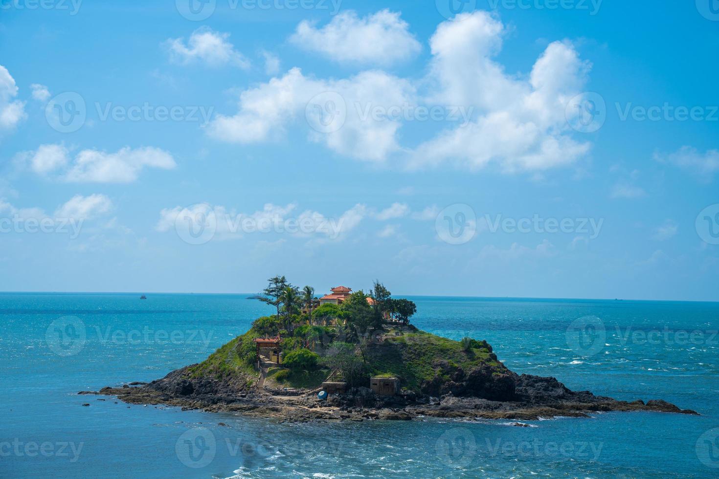 Hon Ba temple Vietnamese language is Mieu Hon Ba is a small pagoda in island in Vung Tau City, Vietnam. People walking in rock to visit temple in middle of month. photo