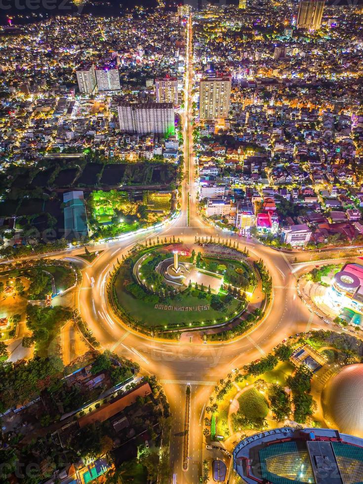Panoramic coastal Vung Tau view from above, with traffic roundabout, house, Vietnam war memorial in Vietnam. Long exposure photography at night. photo