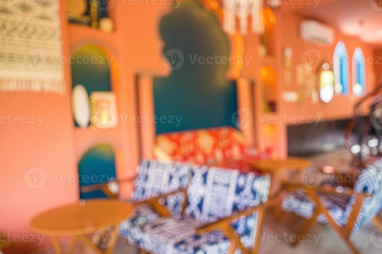 Blurred background Interior of cozy restaurant or coffee shop. Contemporary design in loft style, modern dining place and bar counter, copy space. photo