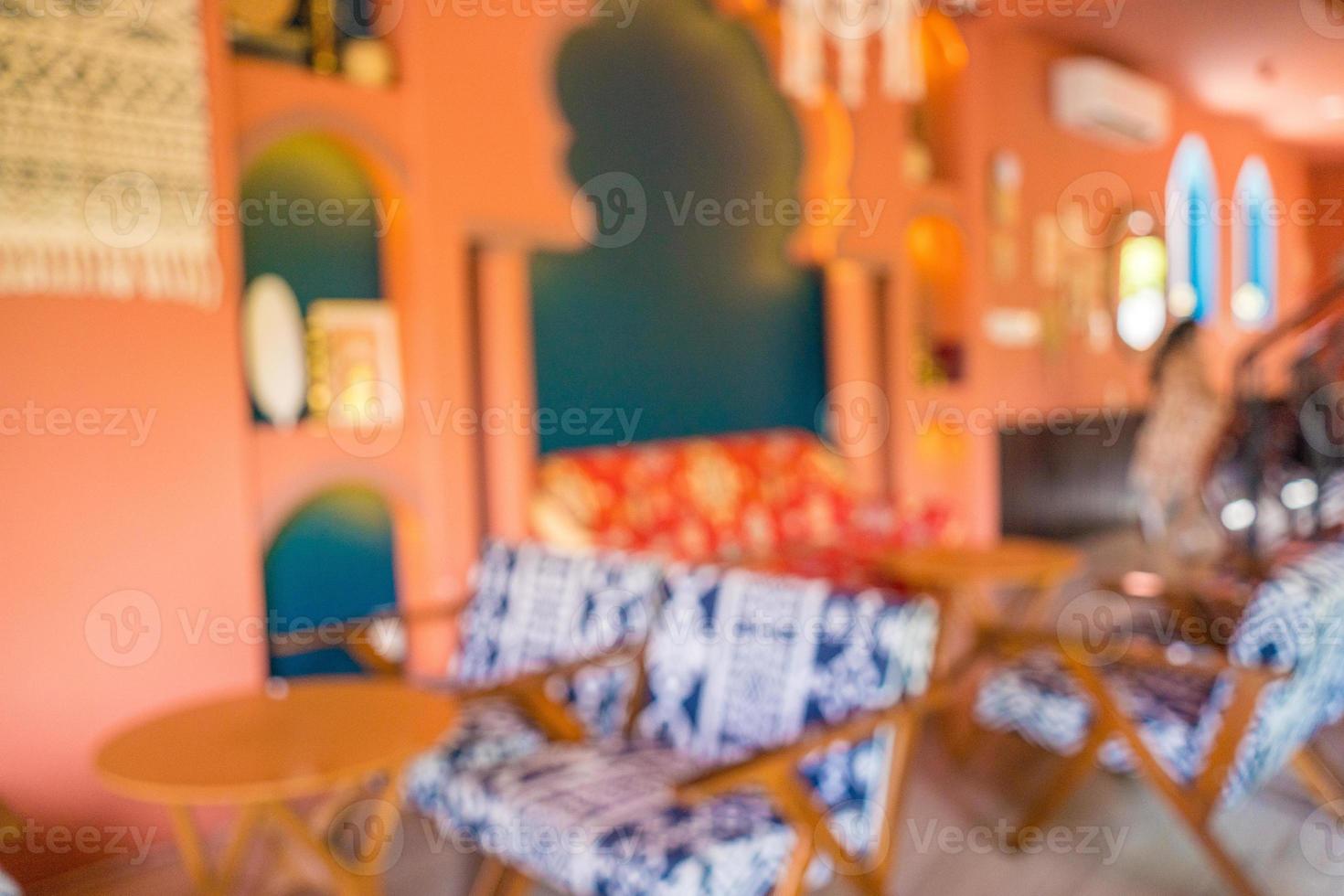 Blurred background Interior of cozy restaurant or coffee shop. Contemporary design in loft style, modern dining place and bar counter, copy space. photo