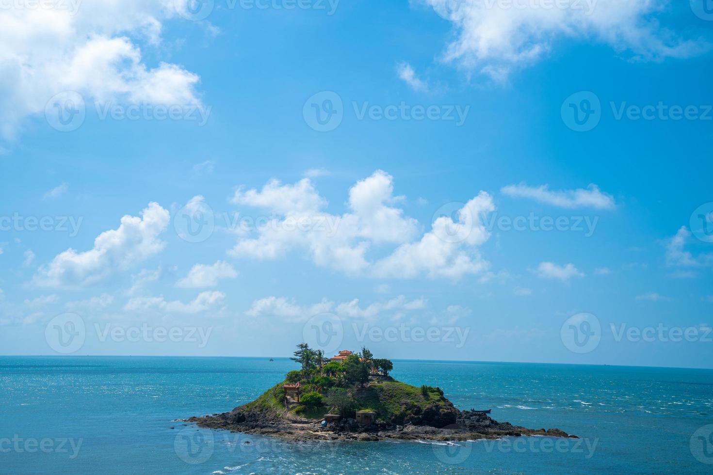 Hon Ba temple Vietnamese language is Mieu Hon Ba is a small pagoda in island in Vung Tau City, Vietnam. People walking in rock to visit temple in middle of month. photo