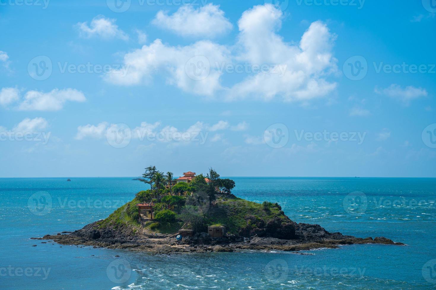Hon Ba temple Vietnamese language is Mieu Hon Ba is a small pagoda in island in Vung Tau City, Vietnam. People walking in rock to visit temple in middle of month. photo