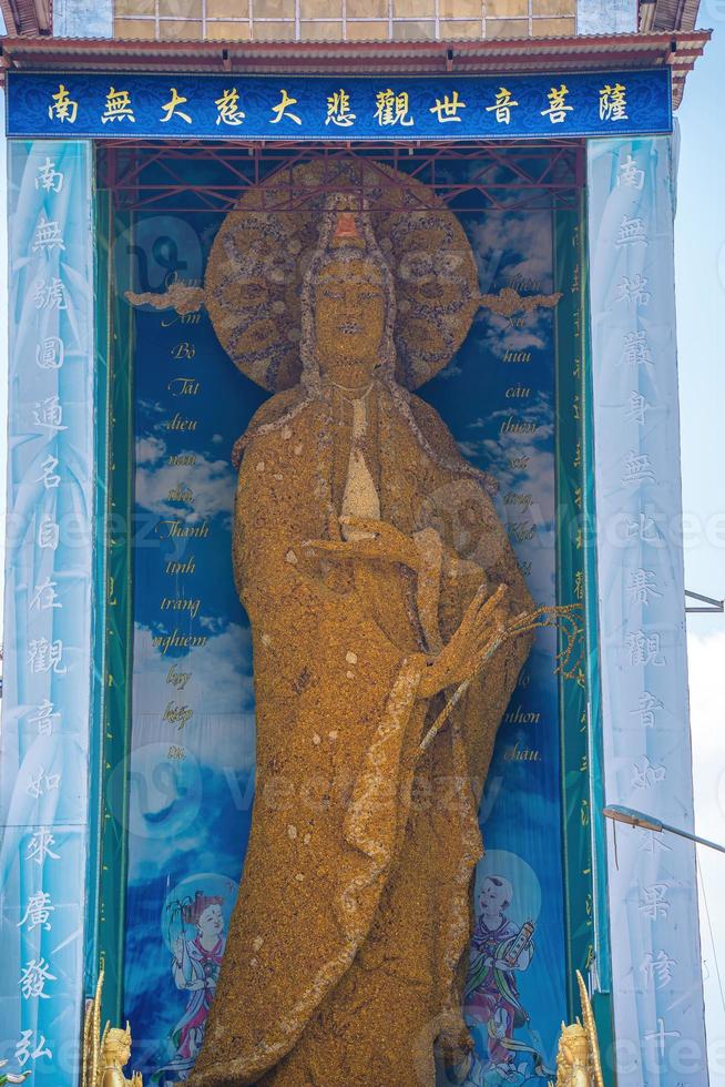 Linh Phuoc Pagoda in Da Lat, Vietnam. Dalat's famous landmark, buddhist porcelain glass temple. The world largest Bodhisattva Avalokitesvara statue made of immortal flower photo